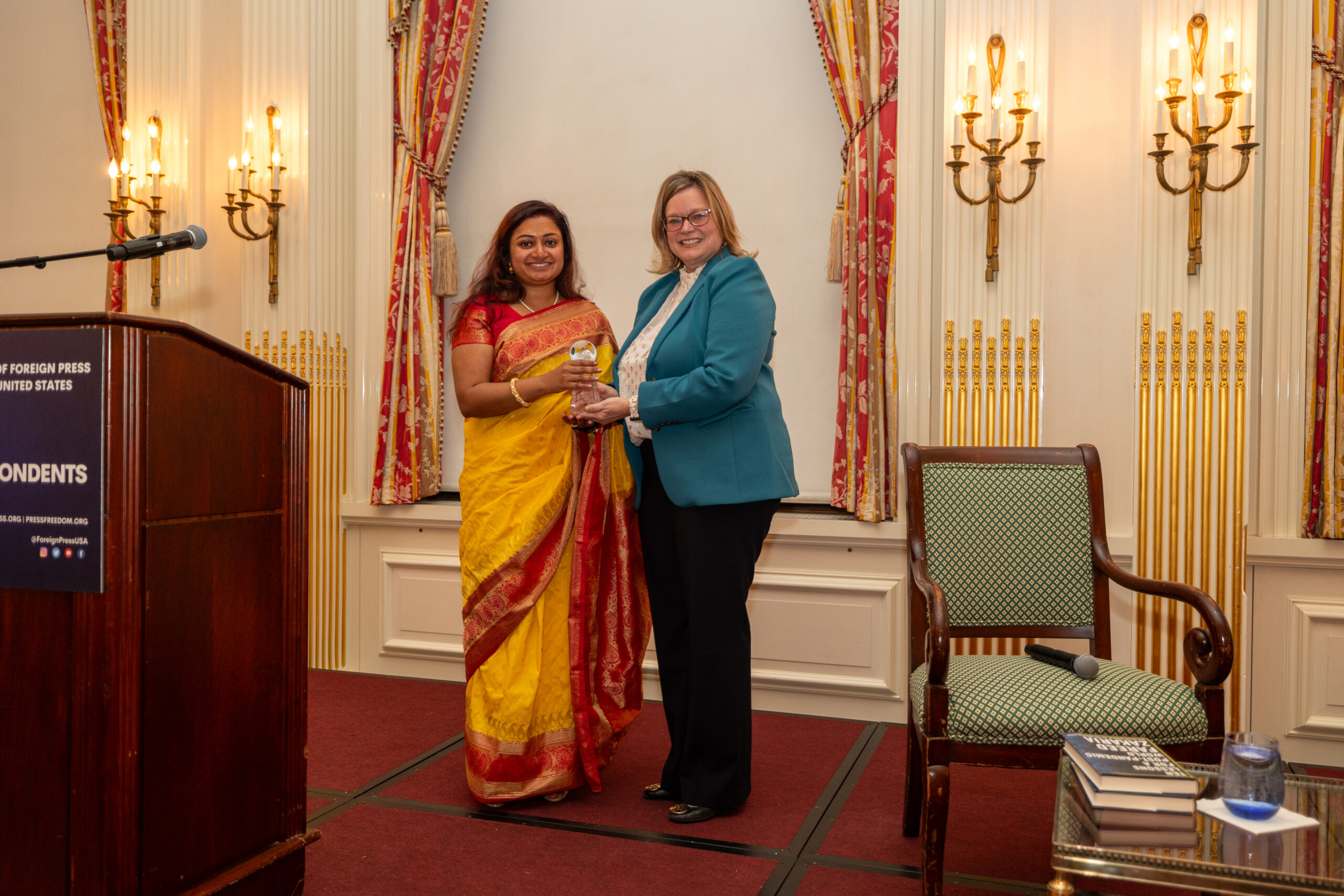 Ankita M. Kumar receiving the AFPC Professional Excellence award
